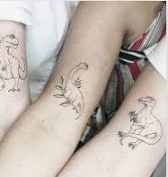 matching dinosaur tattoos