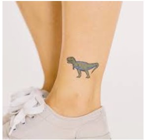 tiny dinosaur tattoo