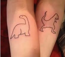 matching dinosaur tattoos