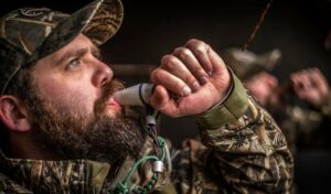 How do I blow a duck call like a pro? 