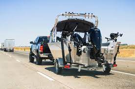 If you have a travel trailer, are you able to pull a boat behind it? (Laws of the States)