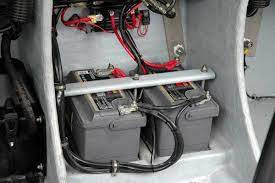 Where exactly should a battery be located inside of a boat?